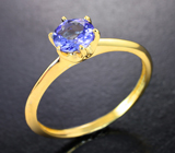 Золотое кольцо с чистейшим танзанитом бриллиантовой огранки 0,66 карата Золото