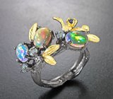 Серебряное кольцо с кристаллическими эфиопскими опалами и голубыми топазами