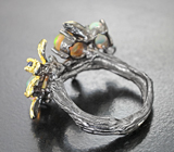 Серебряное кольцо с кристаллическими эфиопскими опалами и голубыми топазами Серебро 925