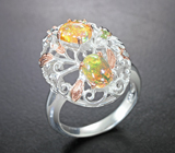 Серебряное кольцо с кристаллическими эфиопскими опалами, перидотами и голубыми топазами