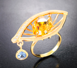 Золотое кольцо с ярким гелиодором авторской огранки 4,61 карата, синим сапфиром и бриллиантами высоких характеристик
