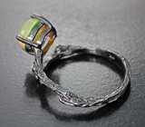 Серебряное кольцо с кристаллическим эфиопским опалом и альмандинами Серебро 925