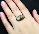 Серебряное кольцо с кристаллическим эфиопским опалом и диопсидами