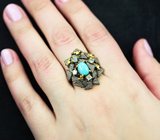 Серебряное кольцо с бирюзой и голубыми топазами Серебро 925