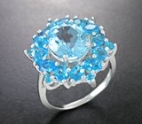 Роскошное серебряное кольцо с голубым топазом и «неоновыми» апатитами