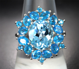 Роскошное серебряное кольцо с голубым топазом и «неоновыми» апатитами