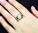 Серебряное кольцо с лунным камнем 3,66 карата и топазами