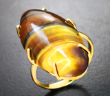 Золотое кольцо с крупным золотистым тигровым глазом 22,73 карата