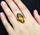 Золотое кольцо с крупным золотистым тигровым глазом 22,73 карата