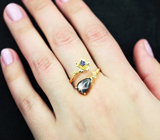 Золотое кольцо cо звездчатым сапфиром редкой формы, синим сапфиром и бриллиантом Золото