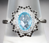 Серебряное кольцо с голубым топазом и черными шпинелями Серебро 925