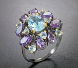 Серебряное кольцо с голубыми топазами и аметистами