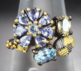 Серебряное кольцо с цитрином, голубыми топазами и танзанитами