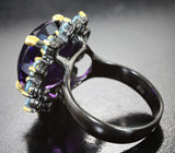Серебряное кольцо с уругвайским аметистом 14,04 карата и голубыми топазами