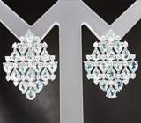 Впечатляющие серебряные серьги с голубыми топазами Серебро 925