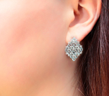 Впечатляющие серебряные серьги с голубыми топазами Серебро 925