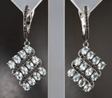 Оригинальные серебряные серьги с голубыми топазами и черными шпинелями Серебро 925