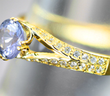 Золотое кольцо с чистейшим ярким танзанитом 0,78 карата и бесцветными цирконами