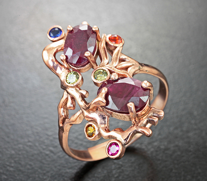 Оригинальное серебряное кольцо с рубинами