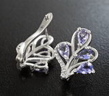 Изысканные серебряные серьги с танзанитами Серебро 925