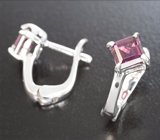 Изящные серебряные серьги с родолитами