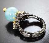 Серебряное кольцо cо сферой аквамарина 13,59 карата и голубыми топазами