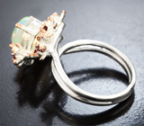 Серебряное кольцо с кристаллическим эфиопским опалом и альмандинами гранатами