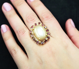 Серебряное кольцо с корундом 32,89 карата и родолитами