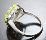 Превосходное серебряное кольцо с перидотами