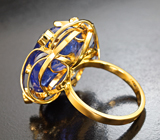 Кольцо с танзанитом 28,6 карата, синими сапфирами и бриллиантами