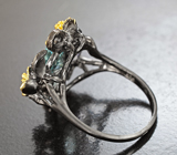 Серебряное кольцо с голубыми топазами, иолитом и аметистами