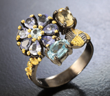 Серебряное кольцо с танзанитами, голубыми топазами и цитрином