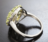 Эффектное серебряное кольцо с перидотами