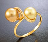 Золотое кольцо с золотистым жемчугом и бесцветными цирконами