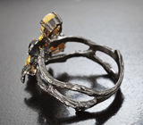 Серебряное кольцо с кристаллическими эфиопскими опалами, голубыми топазами и синим сапфиром Серебро 925