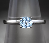 Изящное серебряное кольцо с голубым топазом