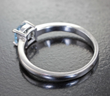 Изящное серебряное кольцо с голубым топазом