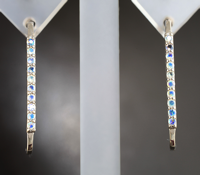 Стильные серебряные серьги с ограненными эфиопскими опалами