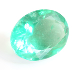 Крупный «неоновый» голубовато-зеленый флюорит 11,69 карата 