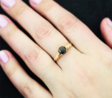 Золотое кольцо с черным 1,17 карата и бесцветными бриллиантами