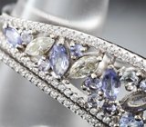 Оригинальное серебряное кольцо на два пальца с танзанитами