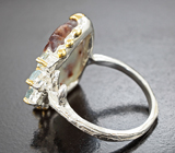 Серебряное кольцо с резным амазонитом и голубыми топазами