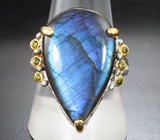 Серебряное кольцо с лабрадоритом 18,21 карата и перидотами Серебро 925