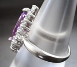 Замечательное серебряное кольцо с аметистом и голубыми топазами