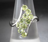 Элегантное cеребряное кольцо с перидотами