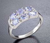 Стильное серебряное кольцо с танзанитами