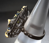 Серебряное кольцо с кристаллическим эфиопскими опалами и перидотами