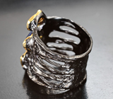 Серебряное кольцо с ограненными черными опалами