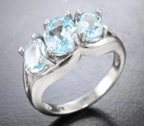 Стильное серебряное кольцо с голубыми топазами