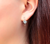 Чудесные серебряные серьги с голубыми топазами Серебро 925